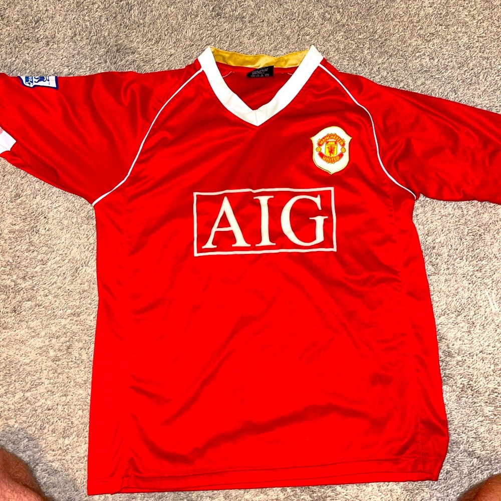 Manchester United M jersey, Barclays, AIG.